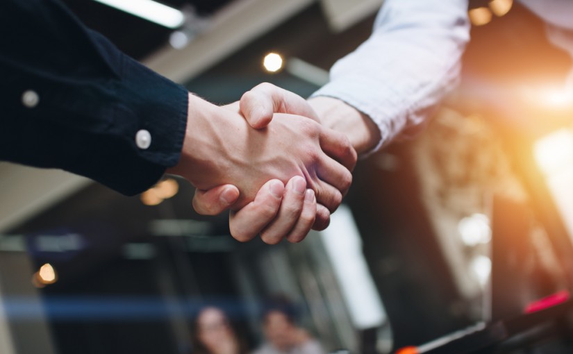 Bussines,Partners,Handshakes,In,Modern,Open,Space,On,The,Background
